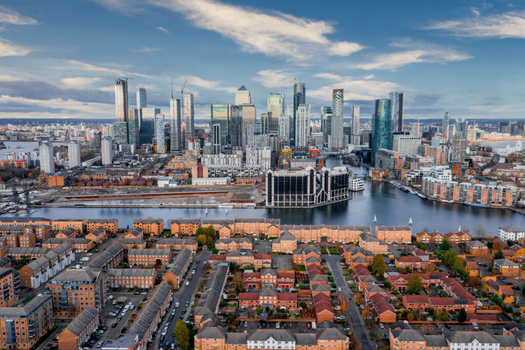 Aerial shot of banks at Canary Wharf in central London' financial district under a cloudy sky